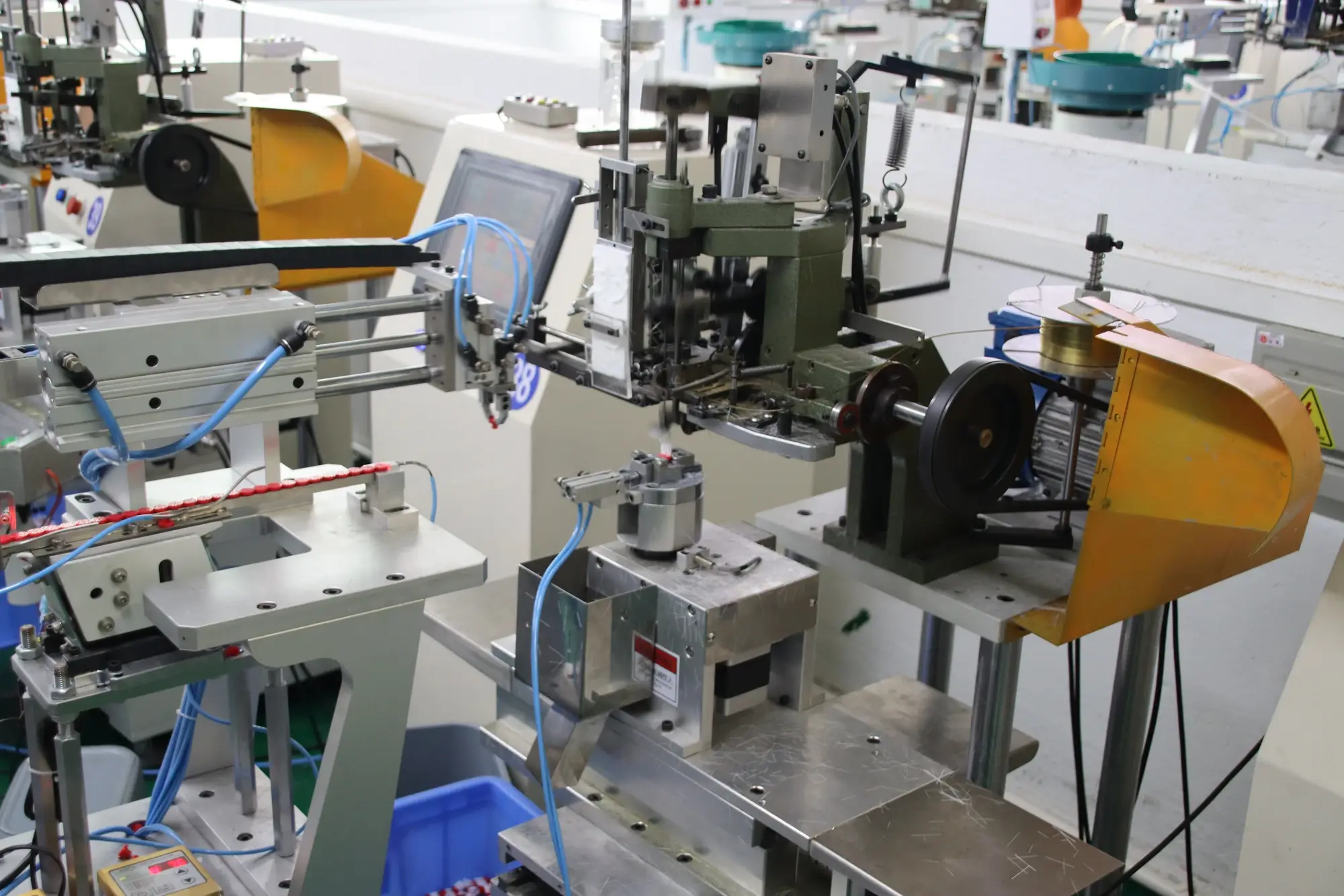 Automated assembly machine for powered oral care device production