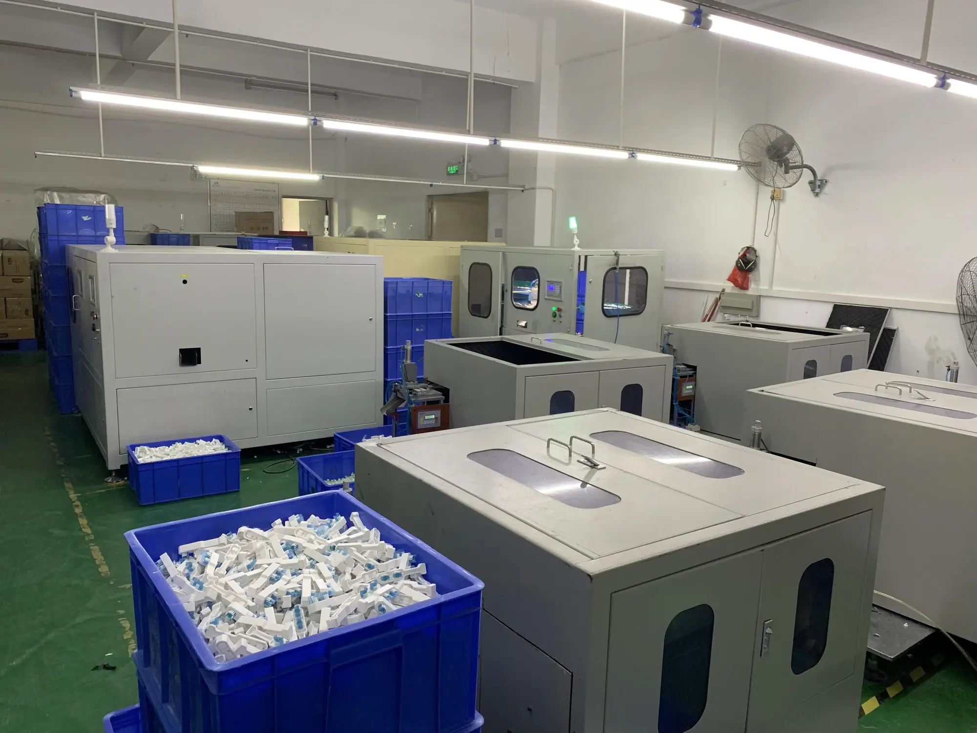 Brush head finishing equipment on the production floor