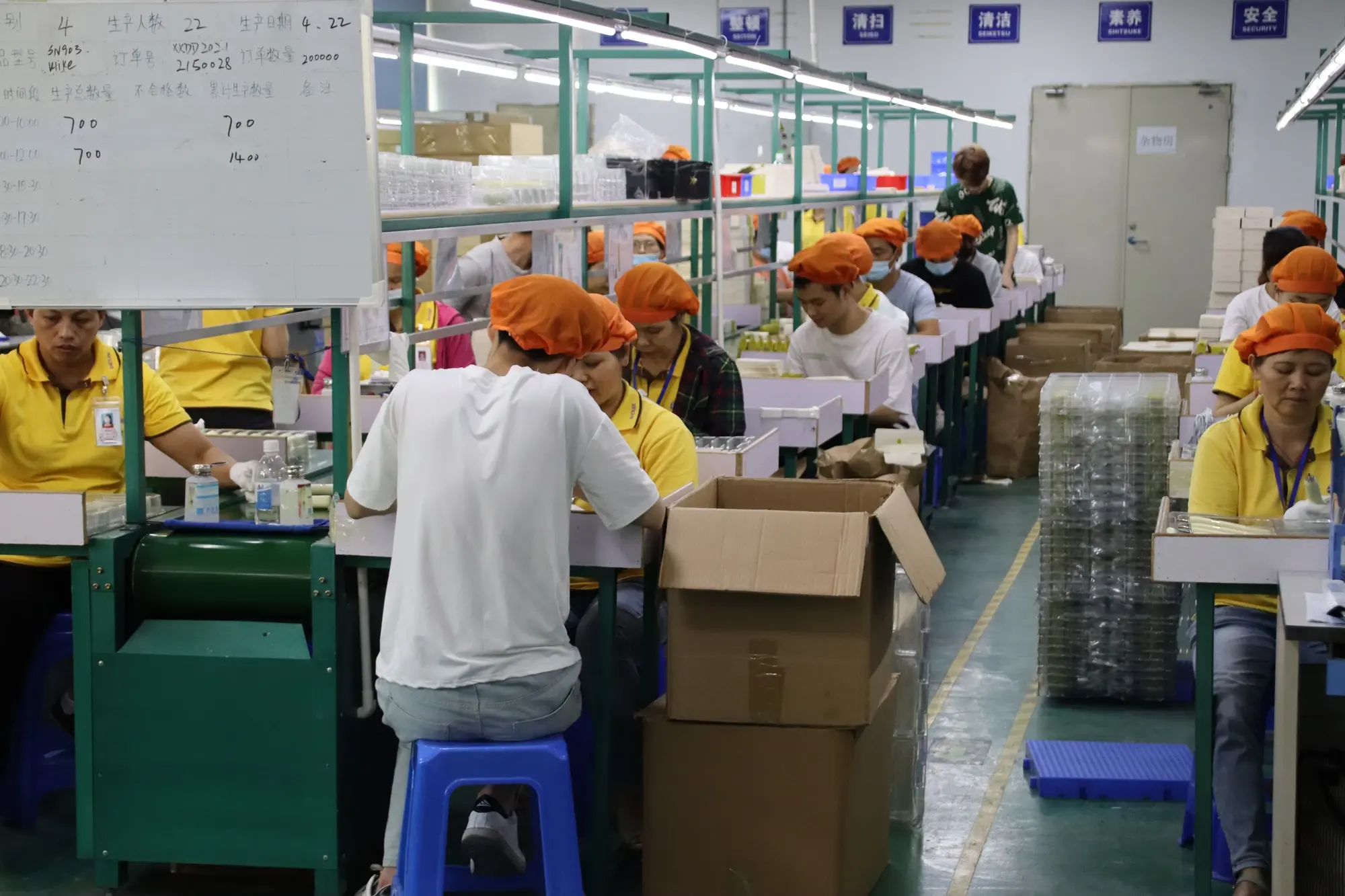 Electric toothbrush assembly and packing line at the AileCare manufacturing facility