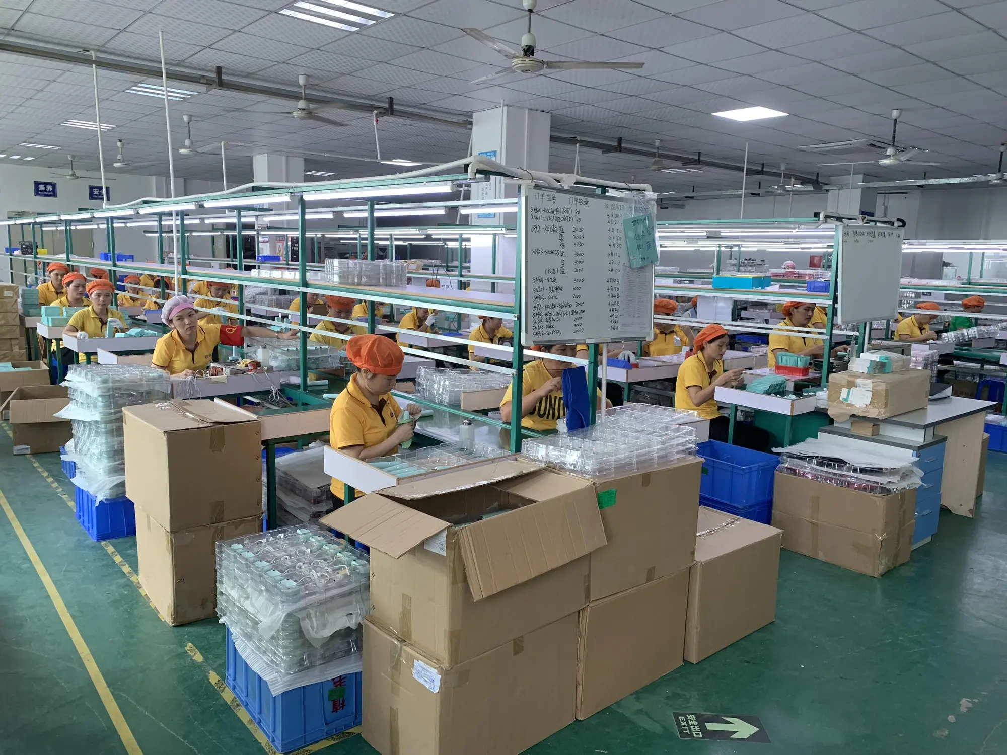 Packaging line for finished powered oral care devices