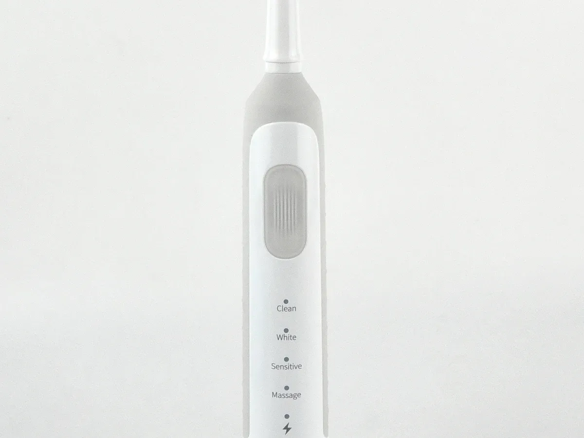 White retail packaging box for a sonic electric toothbrush, reviewed for retail assortment and pack presentation